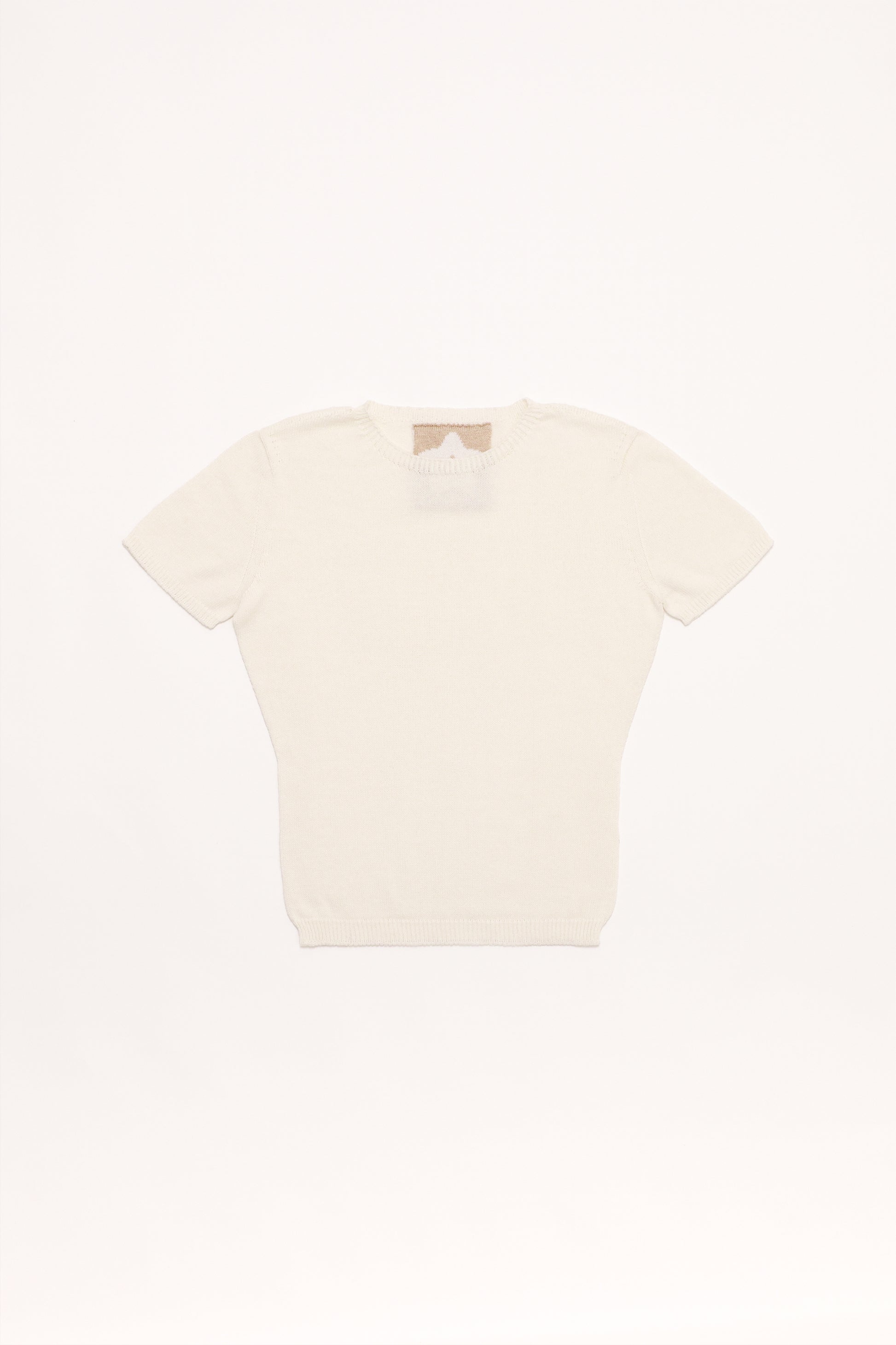 Fruitchouli Plain Knit Baby Tee in White Organic Cotton SeaCell™ – Australian knitwear (Flat Lay Front)