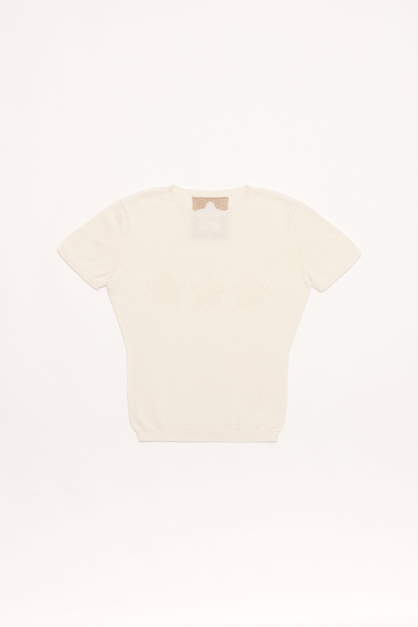 Fruitchouli Stars Openwork Baby Tee in White Organic Cotton SeaCell™ – Australian knitwear (Flat Lay Front)