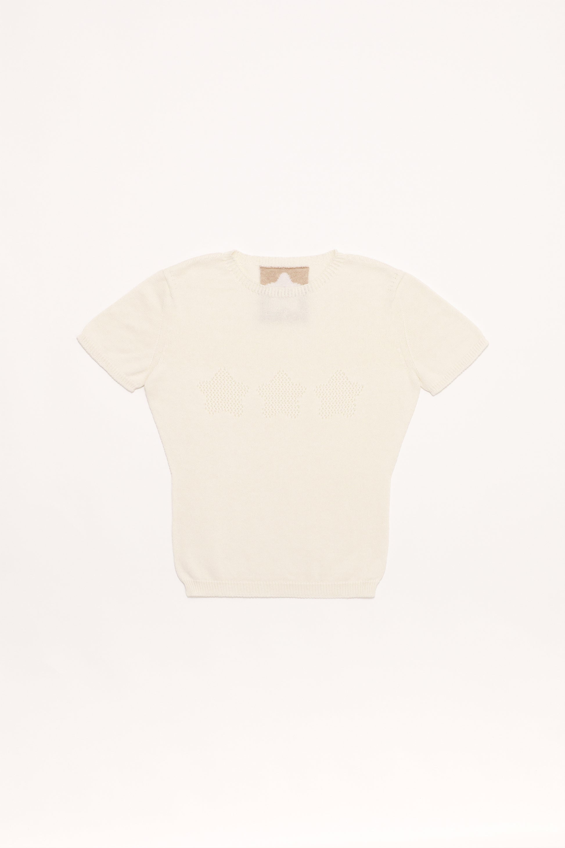 Fruitchouli Stars Openwork Baby Tee in White Organic Cotton SeaCell™ – Australian knitwear (Flat Lay Front)