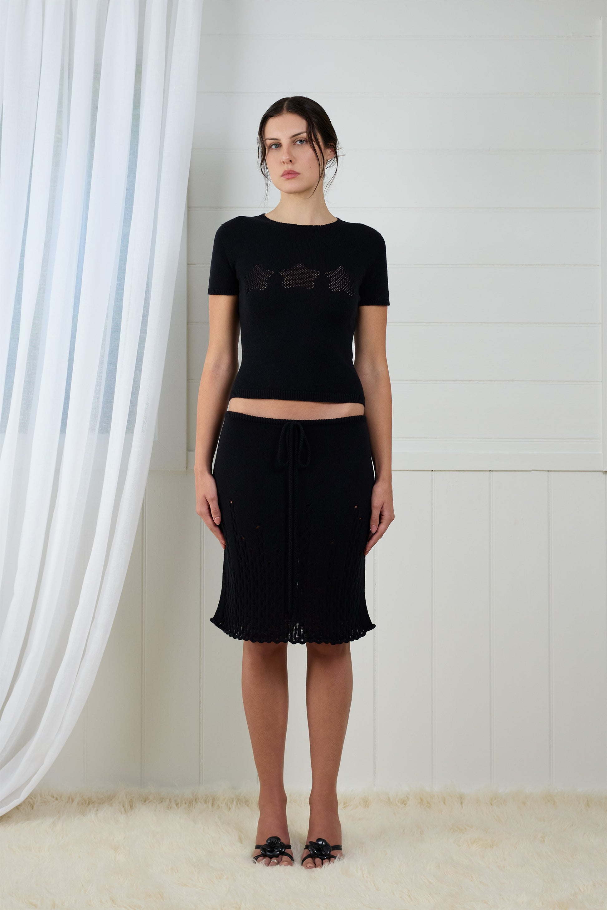 Fruitchouli Stars Openwork Baby Tee in Black Organic Cotton SeaCell™ – Australian knitwear (Front)